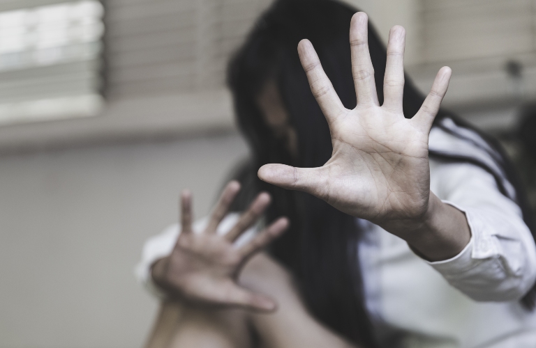 woman raised her hand for dissuade